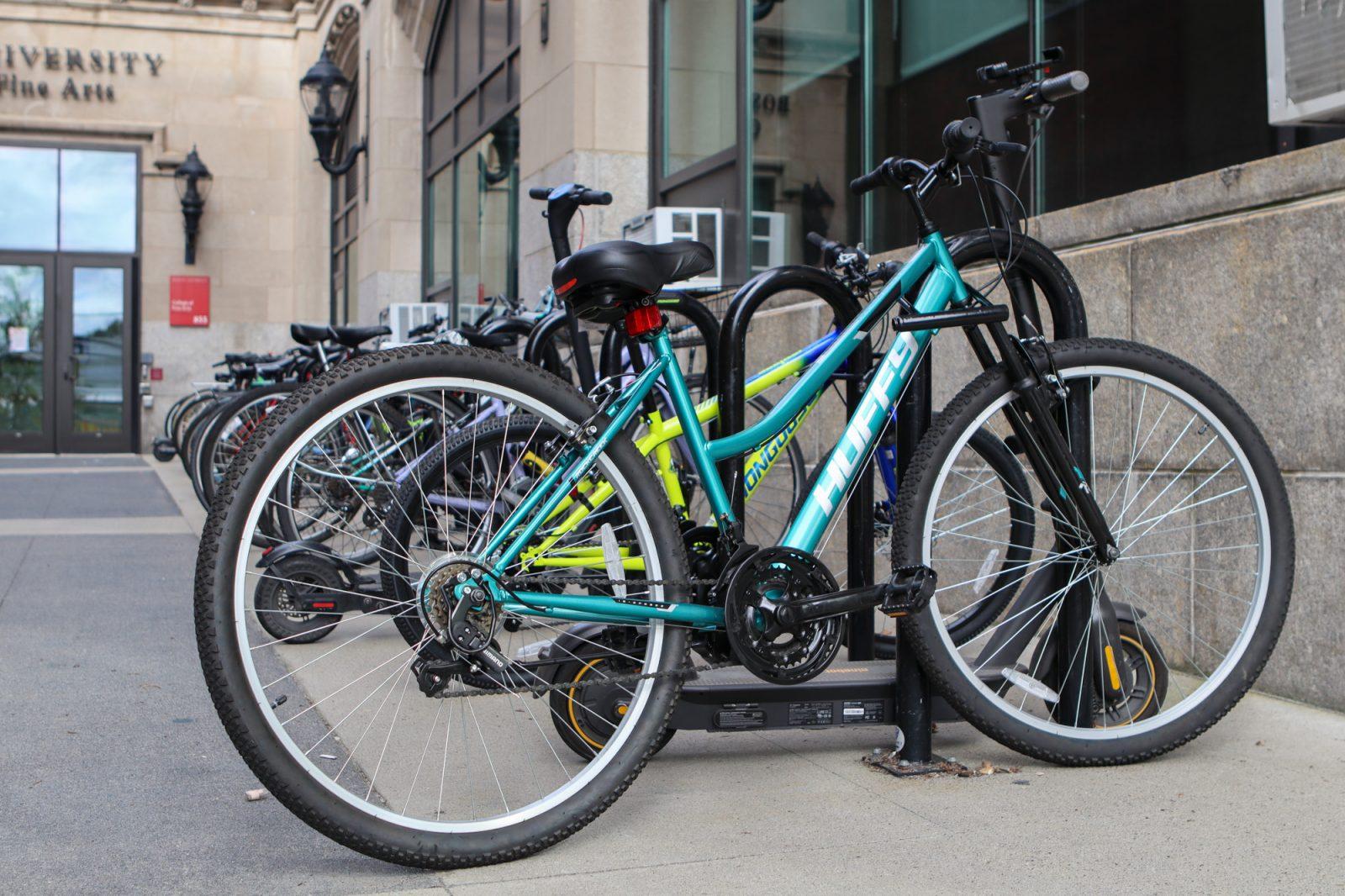 Bikes locked to the bike rack outside of the Boston University College of Fine Arts. No suspects have been identified in connection with the 26 reported bike and scooter thefts in September. RACHEL FEINSTEIN/DFP PHOTOGRAPHER 