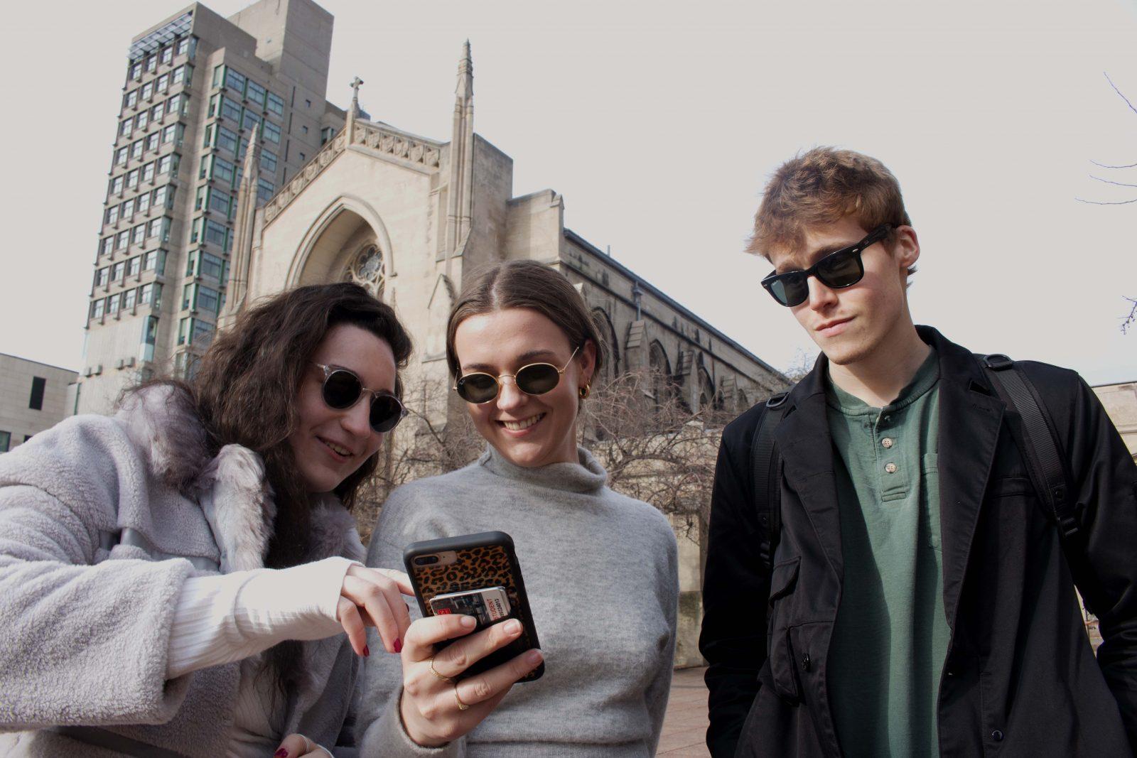 Three Boston University sophomores, Meghan Cronin, Emilie Hibbard and Luc Belder, run the Instagram account Fashion at Boston University. GABRIELA HUTCHINGS/ DAILY FREE PRESS STAFF
