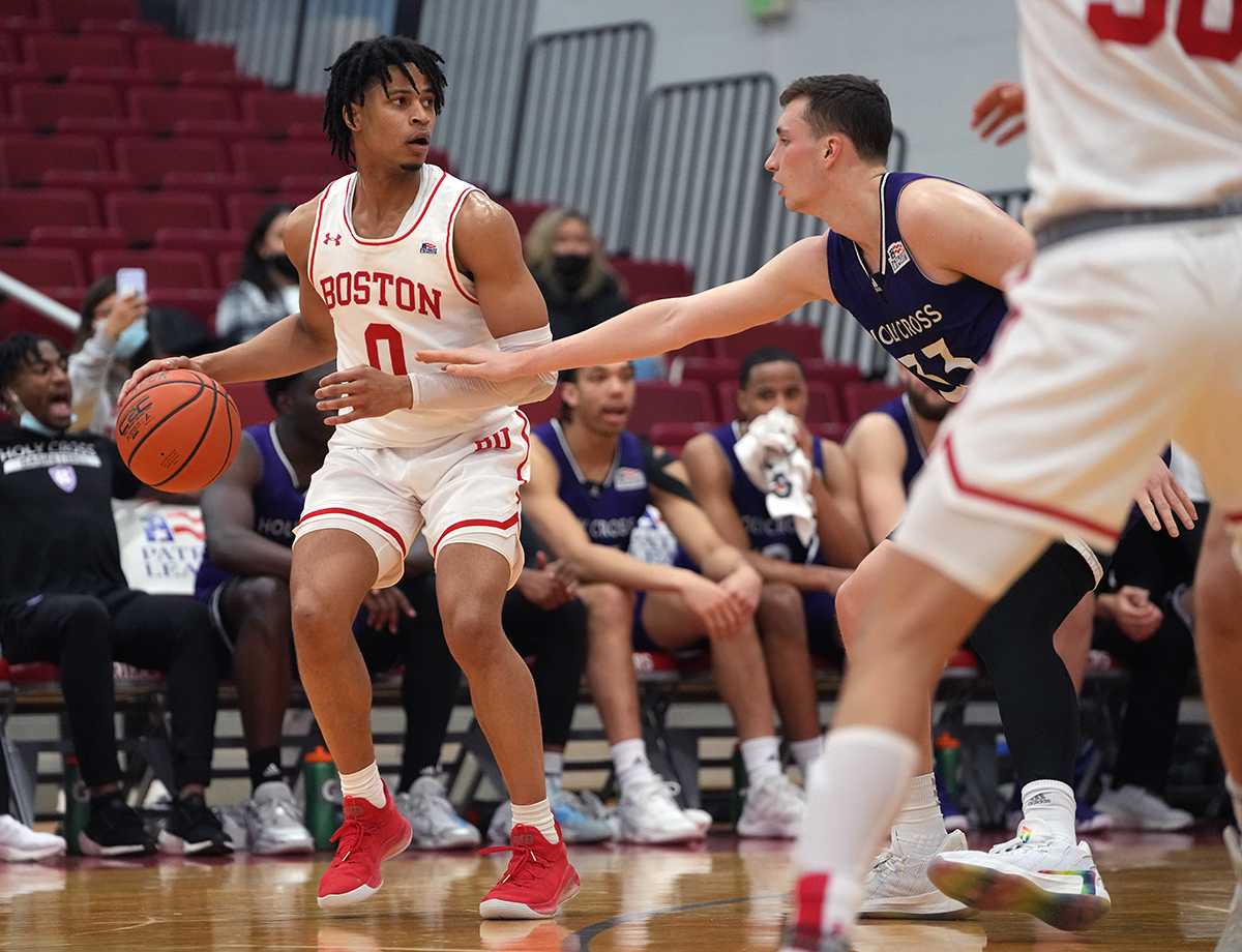 Junior Ethan Brittain-Watts in a game against the College of Holy Cross on Jan. 31. The Boston University men’s basketball team lost their four-game winning streak to the Crusaders 75-70. MOHAN GE/DFP STAFF