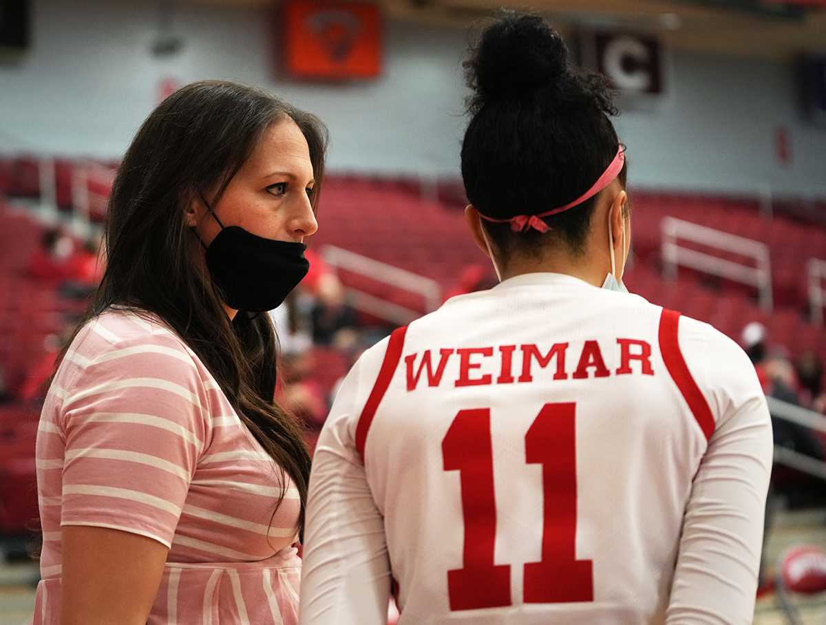 Melissa Graves, Boston University women’s basketball head coach. Graves, pregnant and past her due date, is dedicated to her team having coached almost every game and intends to return to coaching as soon as possible after she gives birth. MOHAN GE/DFP STAFF