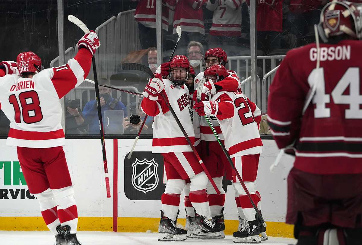 Boston University men’s hockey team celebrates a goal during the Beanpot semifinal against Harvard University. The Terriers claimed victory over Harvard 4-3 Monday in the first game of the 69th annual Beanpot at TD Garden. MOHAN GE/DFP STAFF