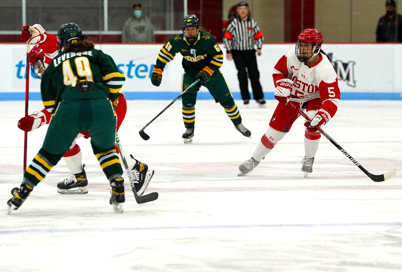 Senior forward Courtney Correia pictured top-right in an ice hockey match against the University of Vermont Friday. After tying 1-1 to the Catamounts Friday, the Terriers beat out the Providence College Friars 2-1 Sunday. MOHAN GE/ DAILY FREE PRESS STAFF