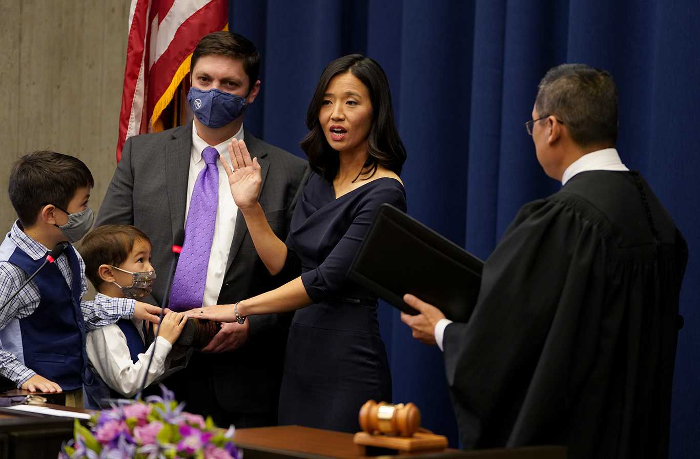 Boston Mayor-elect Michelle Wu swears into the mayoral office Tuesday, becoming the first female mayor and first mayor of color in the city’s history. MOHAN GE/ DAILY FREE PRESS STAFF
