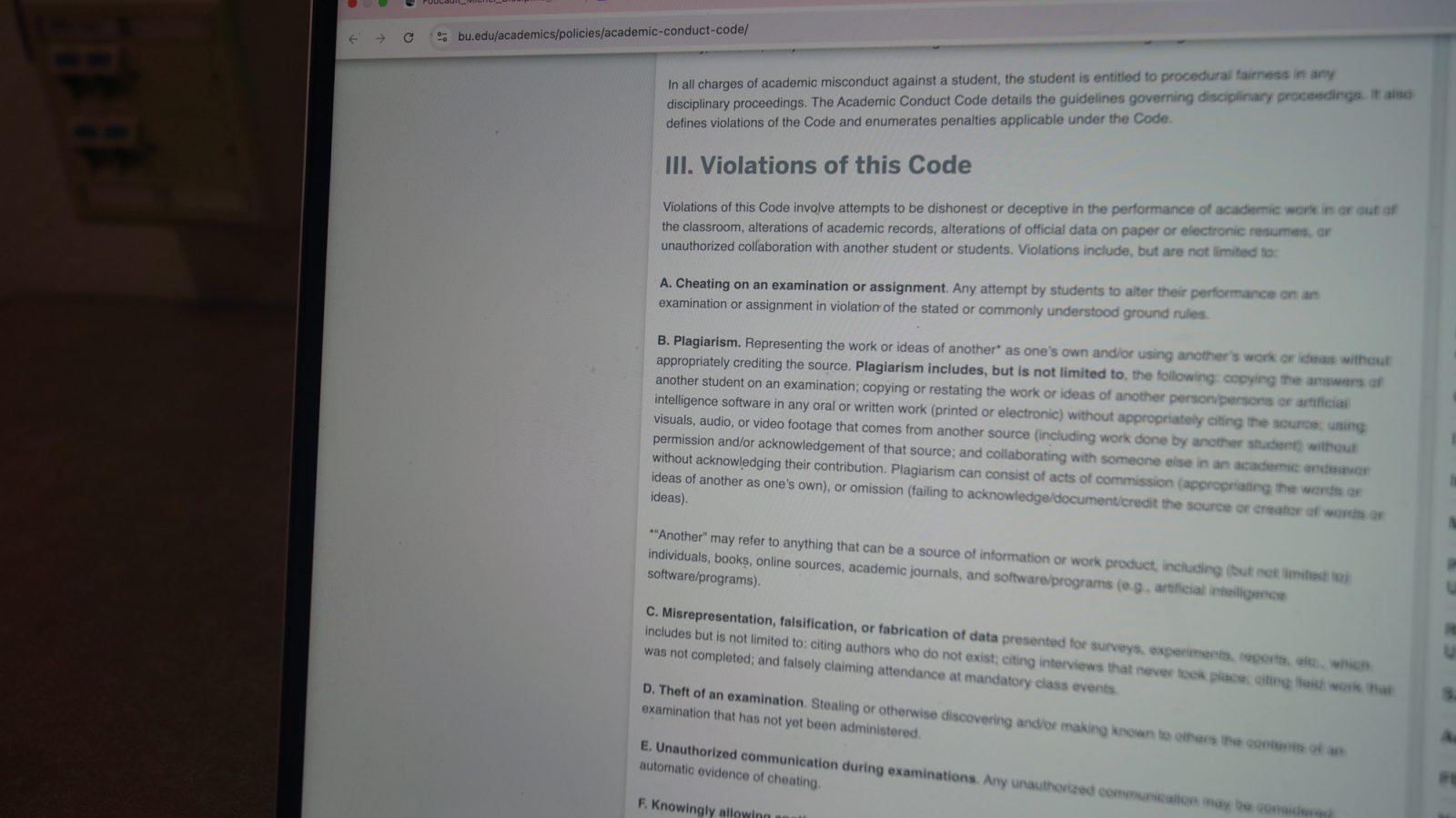Boston University’s Academic Code of Conduct. BU considers claiming the work of artificial intelligence as one’s own without credit to be plagiarism but does not have an institutional policy about AI. SIENA GLEASON/DFP PHOTOGRAPHER