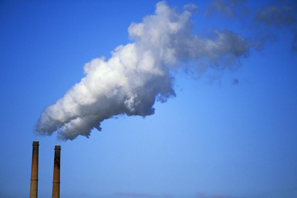 Two smokestacks. The Boston University Institute for Sustainable Energy hosted the first webinar of a two-part series Friday to discuss how to decarbonize existing commercial buildings. COURTESY OF GERALD SIMMONS VIA FLICKR