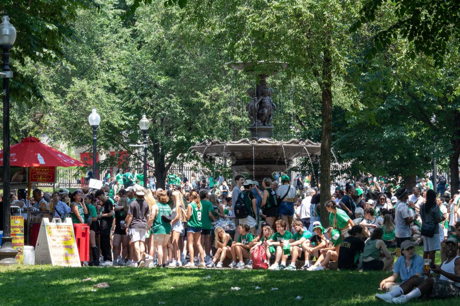 Fans crowd the Boston Common after the Celtics parade ended. HOLLY GUSTAVSEN/DFP PHOTOGRAPHER