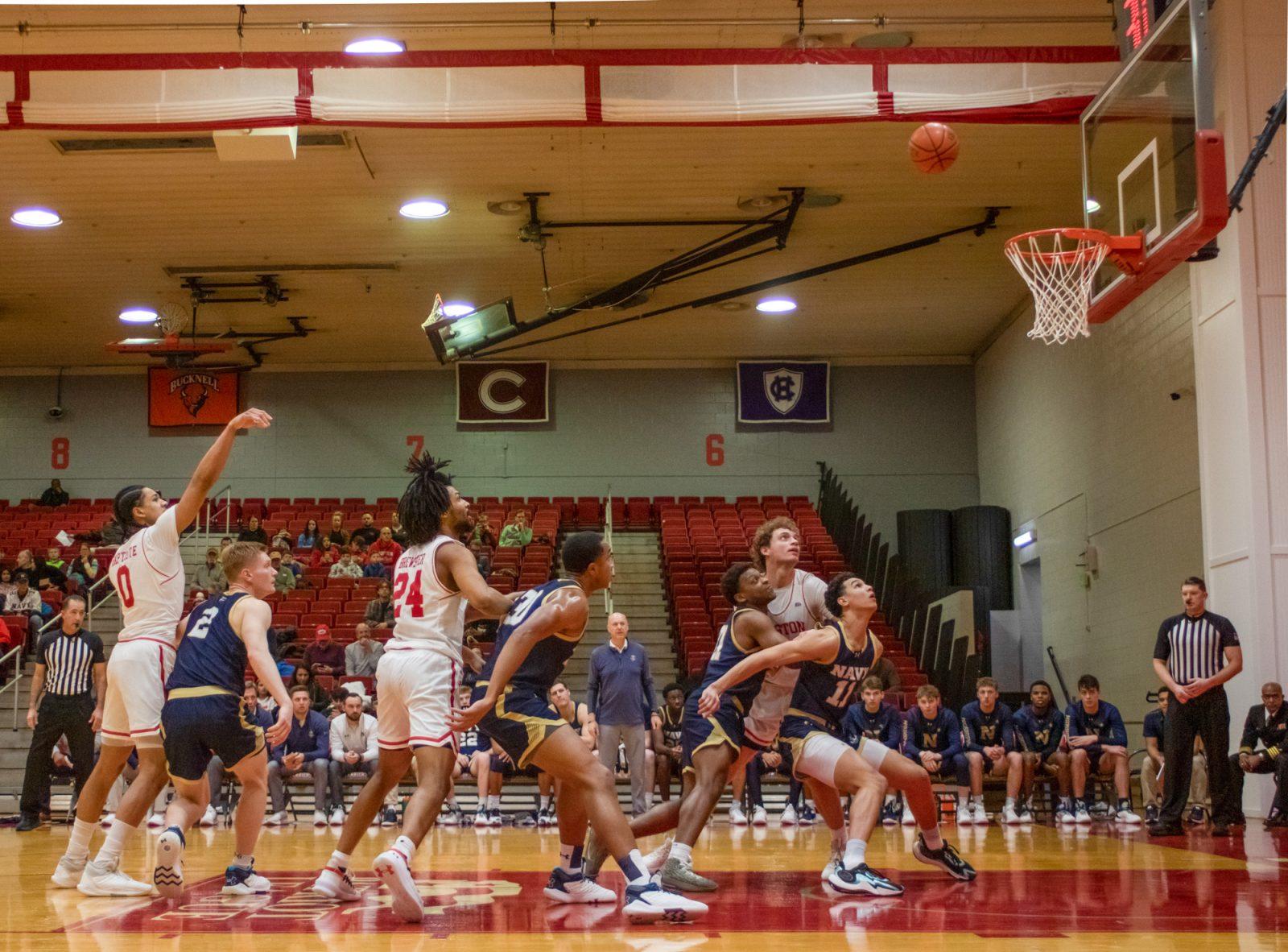 Freshman wing Matai Baptiste (0) shoots a free throw in a game against Navy on Saturday. The Terriers beat Navy 74-65. HOLLY GUSTAVSEN/DFP PHOTOGRAPHER