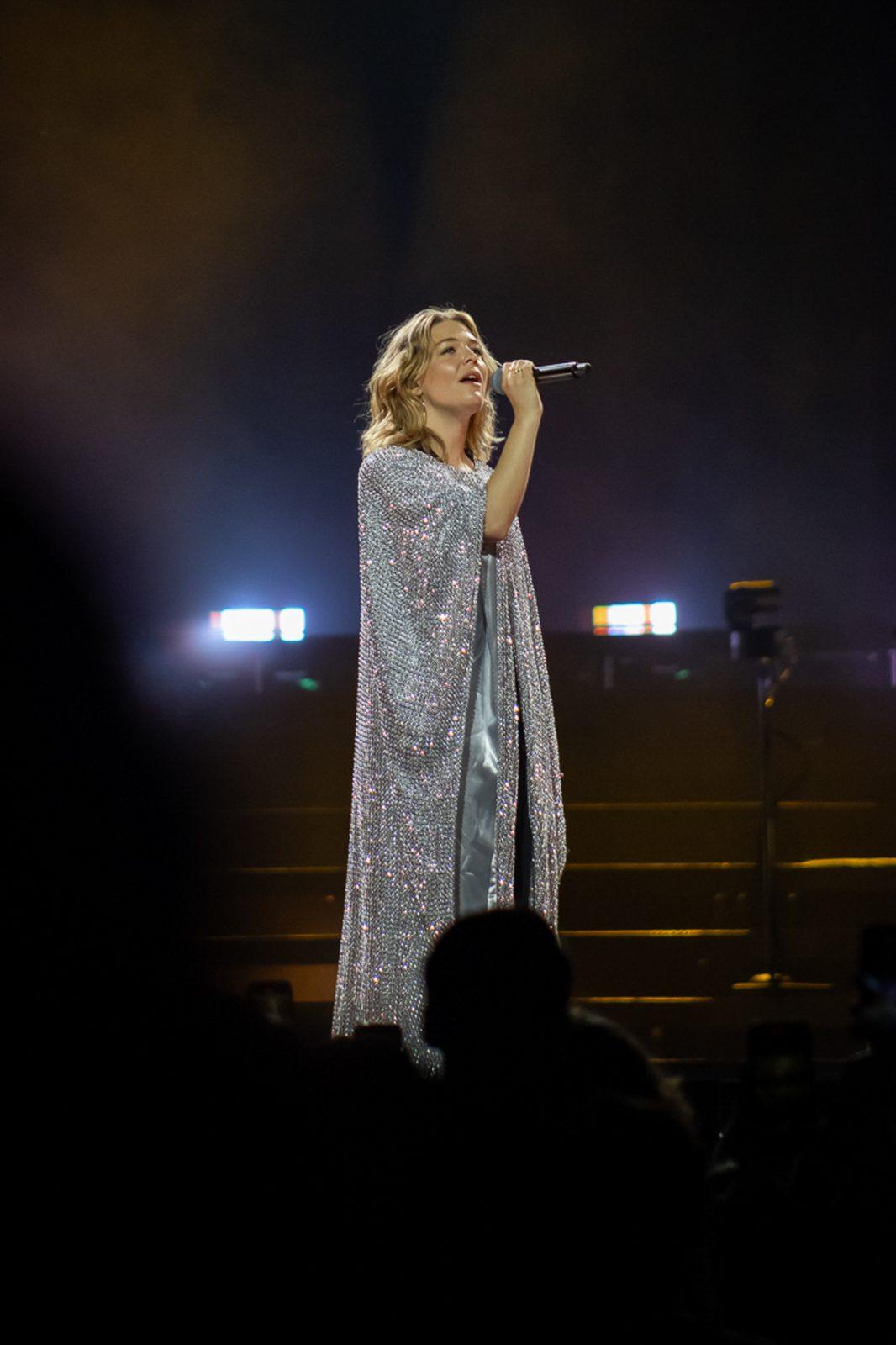 Maggie Rogers singing to a sold-out TD Garden on Oct. 17. 
