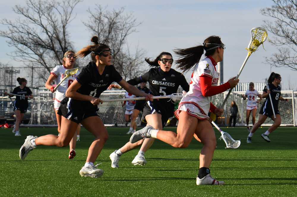 Boston University midfielder Jennifer Barry drives down the field.