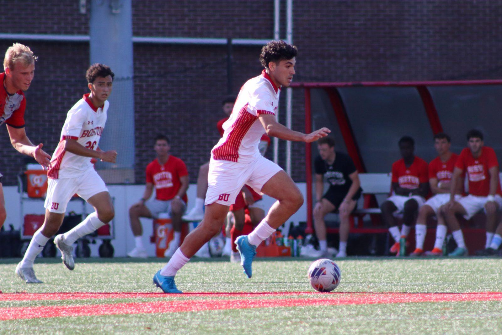 Sophomore forward Andrea Di Blasio (7) dribbles the wall up the field during the men’s soccer game on Thursday. The Boston University men’s soccer team tied Saint Mary’s College of California 1-1. LILY HANSEN/DFP PHOTOGRAPHER 