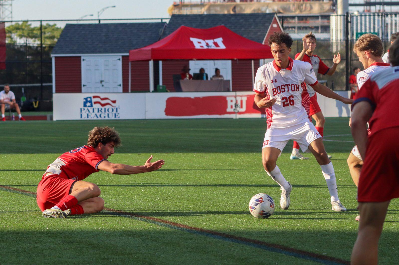 Sophomore midfielder Jason Zacarias (26) dribbles the ball during the men’s soccer game on Sept. 5. The men’s team lost to Santa Clara University 2-1 during their fifth game of the season on Sunday. LILY HANSEN/DFP PHOTOGRAPHER