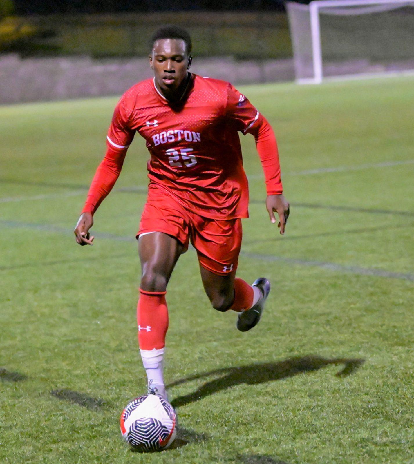 Junior forward Damola Salami (25) in a game against Brown University on Sept. 17. The Terriers tied 2-2 in a game against Loyola Maryland on Saturday. BELLA JONES/DFP PHOTOGRAPHER