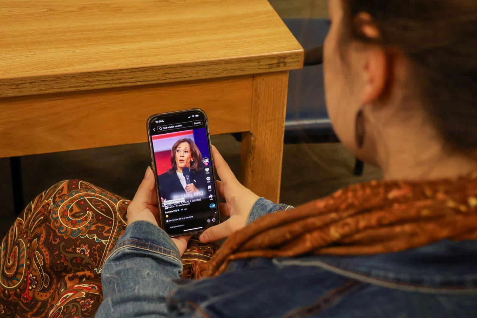 A person watches a TikTok posted by KamalaHQ. Many college students obtain information about politics and the election through social media. MEGAN KWAN/DFP PHOTOGRAPHER 

