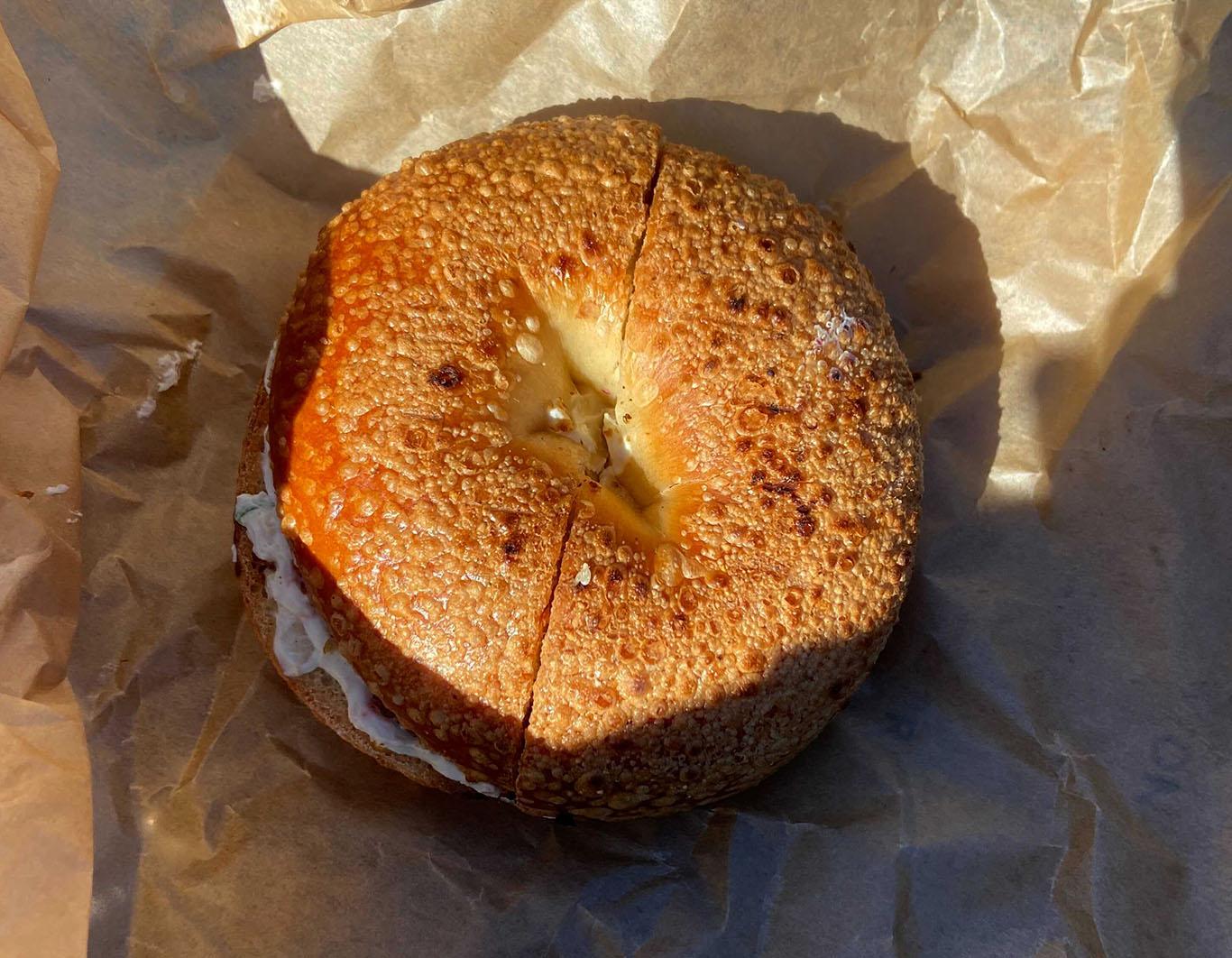 A plain bagel with veggie cream cheese from Pavement Coffeehouse. The Daily Free Press section editors review their favorite bagel orders from spots in and around the Boston University campus. LILY KEPNER/ DAILY FREE PRESS STAFF