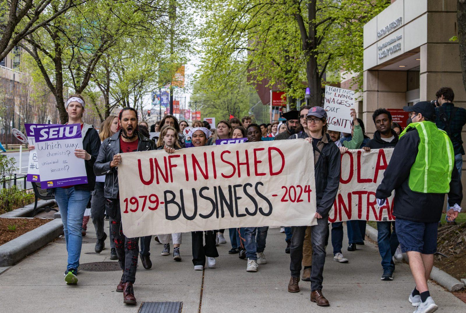 Protestors march down Commonwealth Avenue toward 1 Silber Way during the Boston University Graduate Workers Union walkout on May 1. BUGWU and BU reached settlement agreements Dec. 19 for two outstanding charges filed during the strike. KATE KOTLYAR/DFP PHOTOGRAPHER