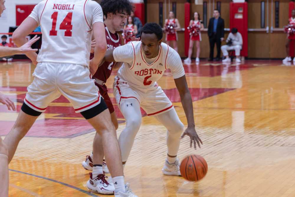 Freshman guard Kyrone Alexander (5) dribbles the ball in a game against Colgate on Wednesday. The Terriers triumphed on the road over the Bucknell Bison 77-62 on Saturday. KATE KOTLYAR/DFP PHOTOGRAPHER