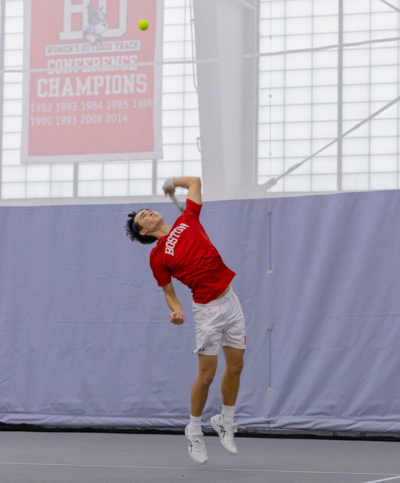 Sophomore Patriot League Rookie of the Year Corey Craig prepares to serve in a match against Bentley on Sunday. Men’s and women’s tennis are looking to return to the Patriot League finals this year as the runner-up and defending champions, respectively. KATE KOTLYAR/DFP PHOTOGRAPHER