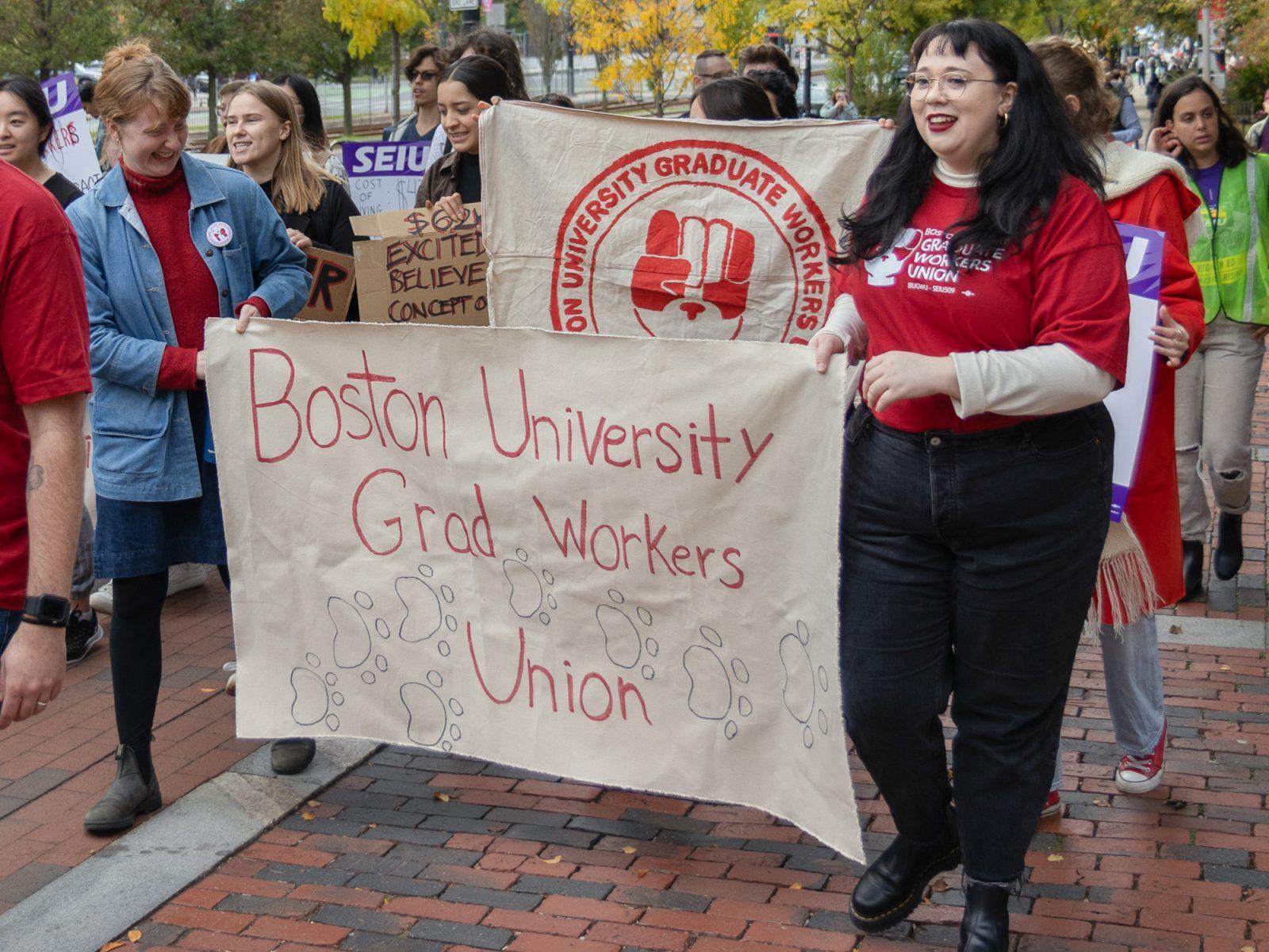 Boston University Graduate Worker Union (BUGWU) members march down Commonwealth Avenue at a combined union rally last October. BUGWU will begin striking on Monday at Marsh Chapel, following eight months of negotiations. KATE KOTLYAR/DFP PHOTOGRAPHER 