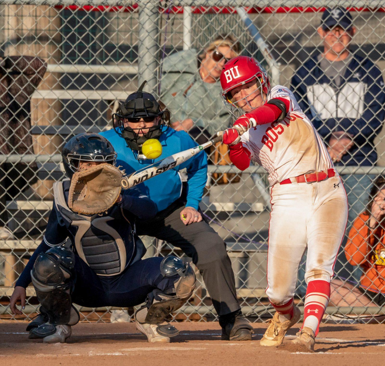 Sophomore infielder Brooke Deppiesse (4) swings at a pitch. The Boston University softball team won the Patriot League and reached the national tournament last season. HUI-EN LIN/DFP PHOTOGRAPHER
