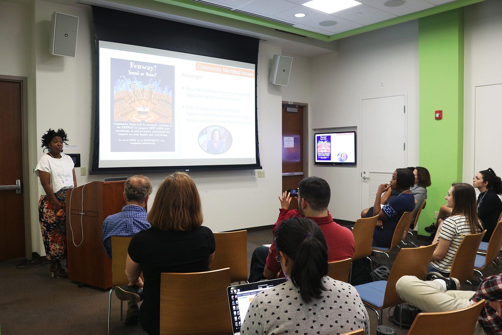 Researcher Erica Walker discusses phone app NoiseScore, which was developed to address urban noise issues, at Boston University’s Hariri Institute for Computing on Thursday. LIBBY MCCLELLAND/ DAILY FREE PRESS STAFF
