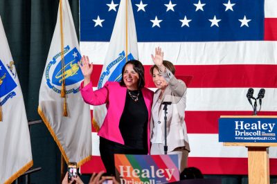 Maura Healey and Kim Driscoll waving
