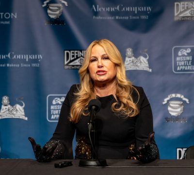Jennifer Coolidge talking to journalists during the press conference.