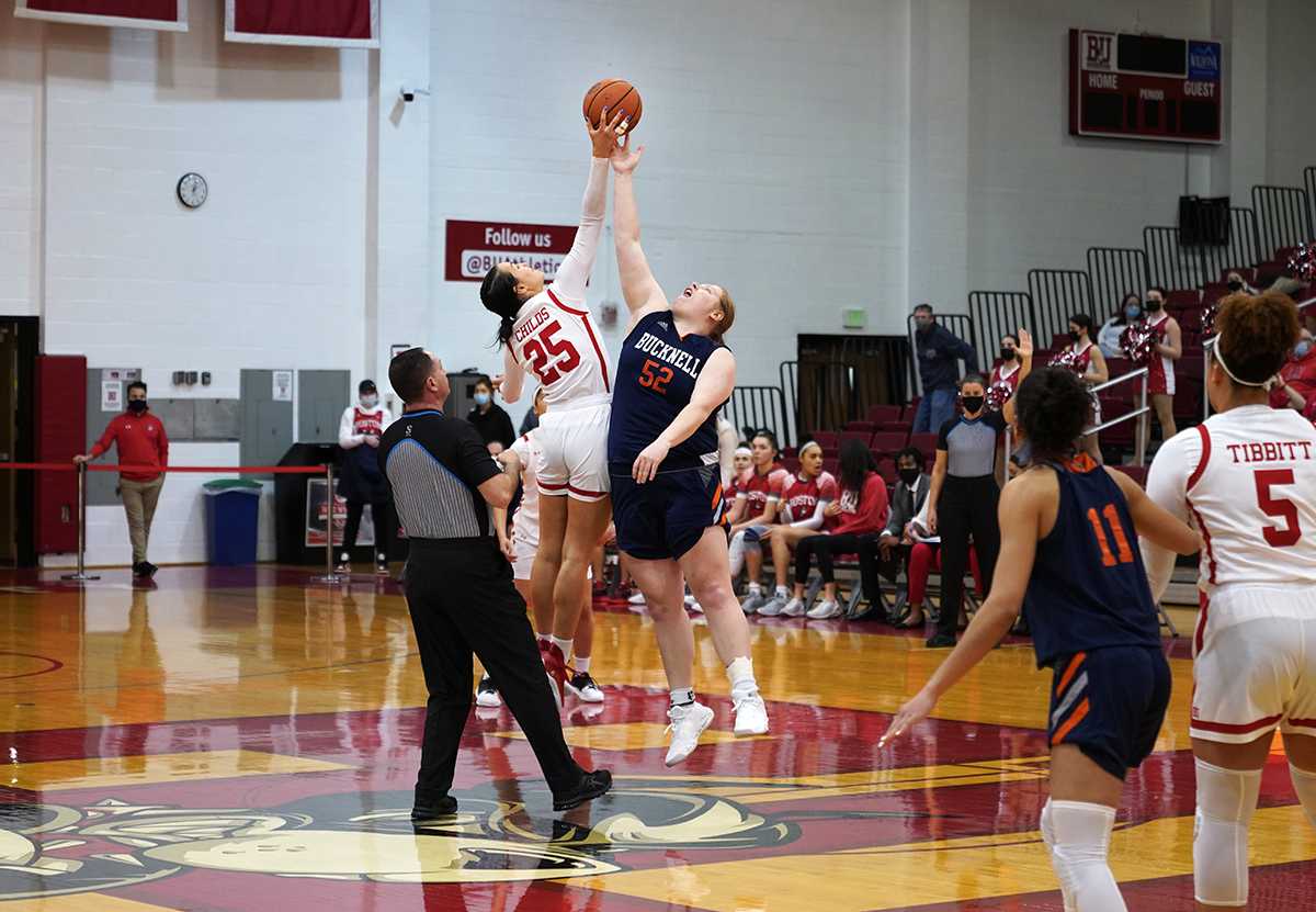 Senior Riley Childs during the tip-off in a game against Bucknell University Feb. 26. The Boston University women’s basketball team won 69-51 on senior day — coached by assistant coach Brianna Finch while head coach Melissa Graves had her child Saturday. HUI-EN LIN/DFP STAFF