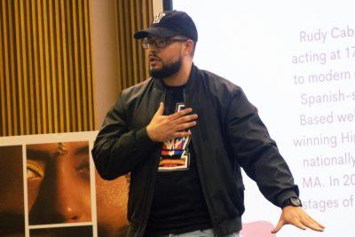 Poet Rudy Cabrera talks at the Speak Your Truth event.