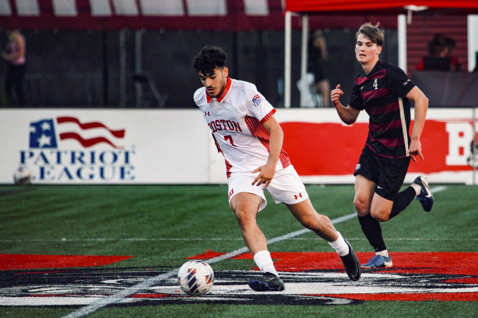 Sophomore forward Andrea Di Blasio (7) dribbles the ball down the field during the men’s soccer game on Saturday. The team earned their seventh tie game this season with a final score of 1-1. TRACY LIU/DFP PHOTOGRAPHER 