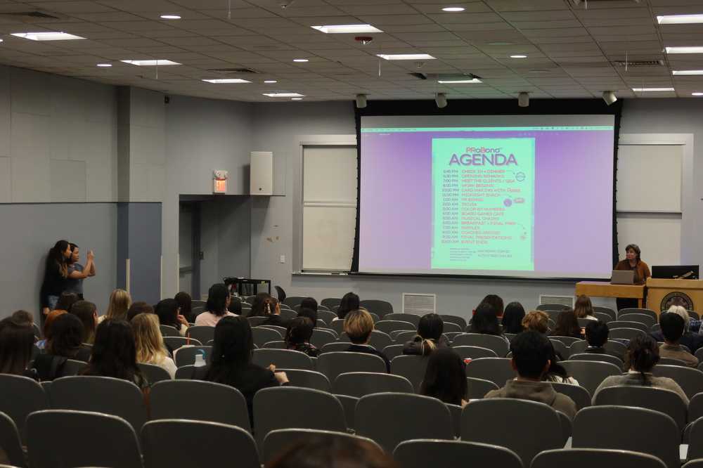 Attendees of PRLab’s PRoBono review the event’s agenda. The overnight communication marathon created deliverables for five nonprofit organizations. PHOTO COURTESY OF VICTORIA LUO