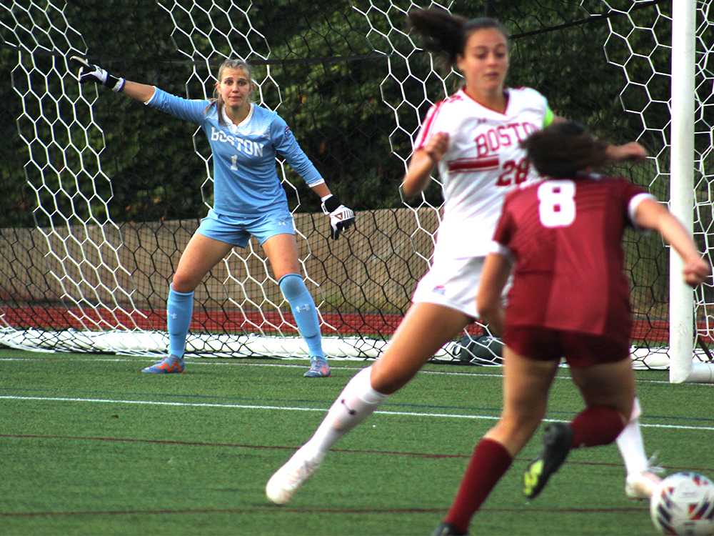 Boston University junior goalkeeper Celia Braun (1) directs her teammates during a Wednesday game against Colgate University at Nickerson Field. The Terriers won 2-0. ISABELLE MEGOSH/DFP PHOTOGRAPHER