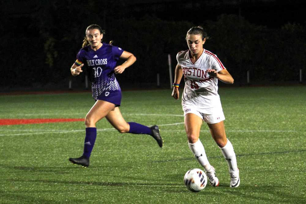 Sophomore midfielder Giulianna Gianino (15) dribbles down the field.