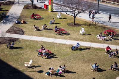 boston university students on the college of communication lawn