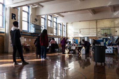 Voters in line at Higginson-Lewis K-8 school