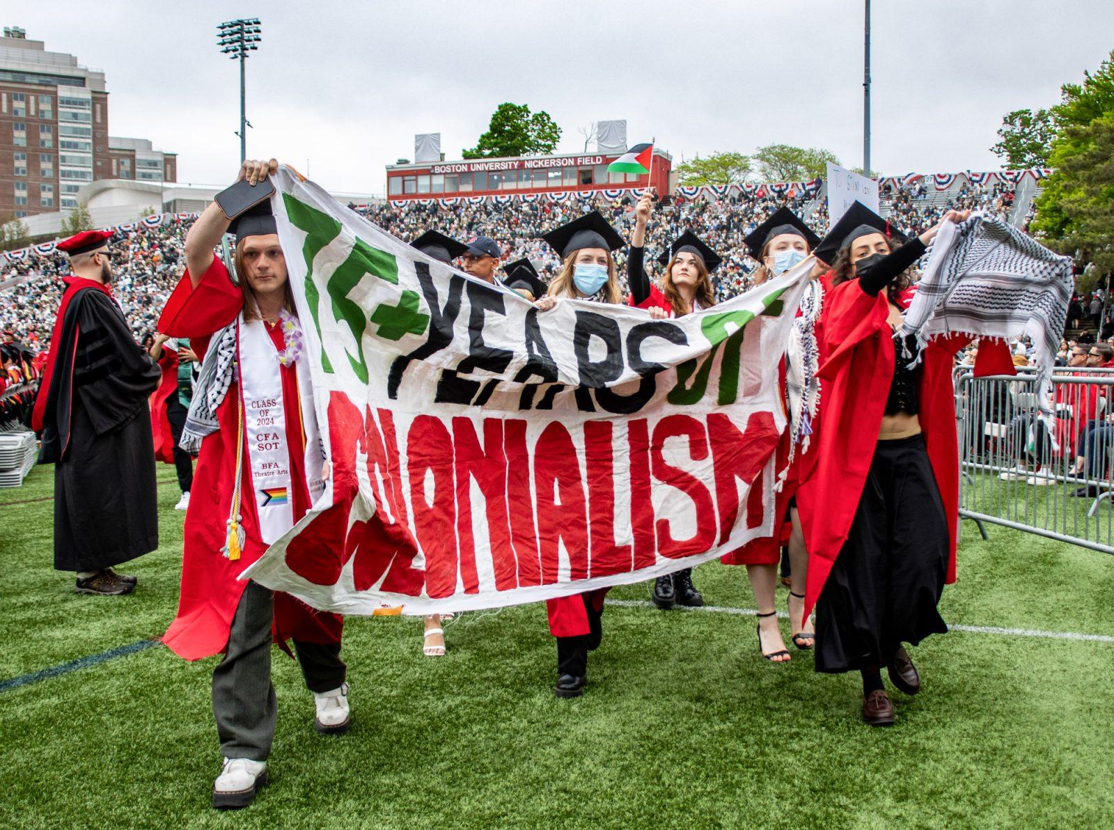 Graduates walk out of Boston University’s 2024 Commencement in protest of Israel’s occupation of the Gaza Strip and West Bank. Several demonstrations occurred at university commencement ceremonies, such as Boston University and Harvard University, in response to the war in Gaza. CLARE ONG/DFP PHOTOGRAPHER