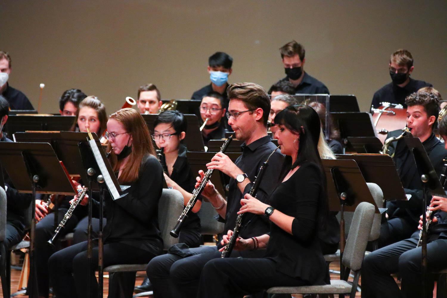 The Boston University Wind Ensemble performing at Tsai Performance Center Tuesday night. The music group has eagerly returned to performing for live audiences this semester after enduring a year of pandemic-induced challenges. CLARE ONG/ DAILY FREE PRESS STAFF