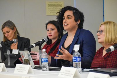 Person speaking at a roundtable