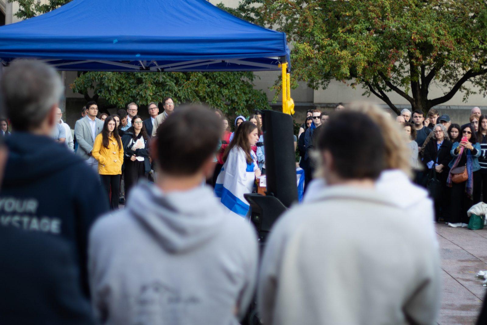 A person speaks at the Boston University Students for Israel and BU Hillel memorial Oct. 7. Harvard’s settlement of an antisemitism lawsuit has sparked debate over campus free speech, prompting students to take action by launching Our CampUs United to combat antisemitism on college campuses. ZACH SCHWARTZ/DFP PHOTOGRAPHER 
