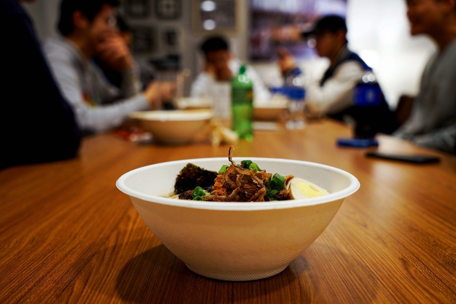 Students eat ramen at the new O-Mori Ramen Bar in East Campus’ Bay State Underground. SERENA YU/ DAILY FREE PRESS STAFF