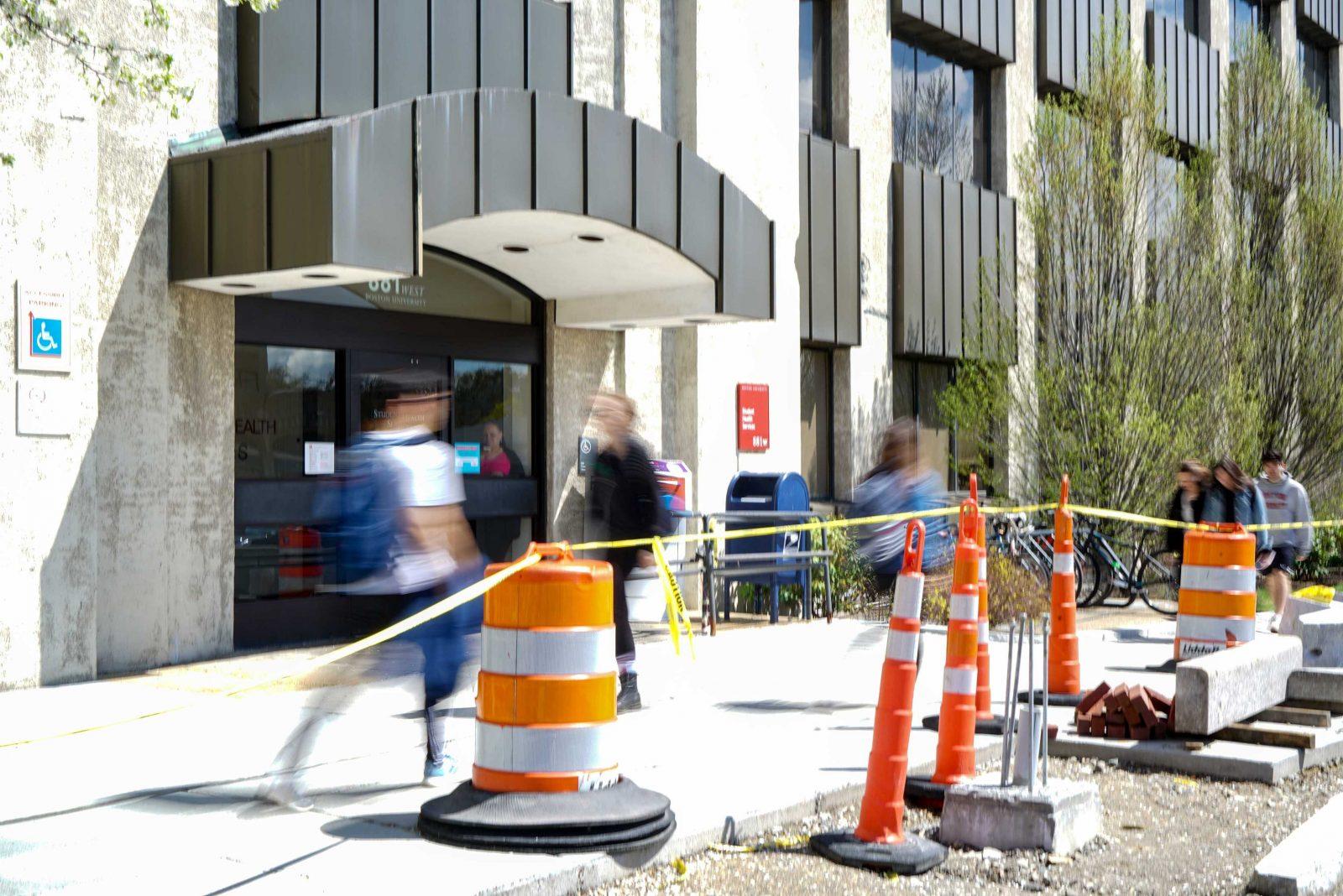 Students pass Boston University’s Student Health Services. SHS gives students the option to opt-out of certain vaccination requirements due to their religious beliefs.
SERENA YU/ DFP STAFF