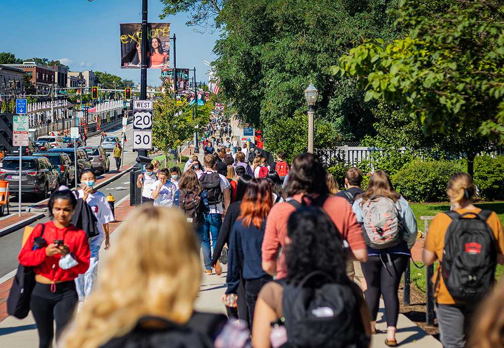 People walk down Commonwealth Ave.