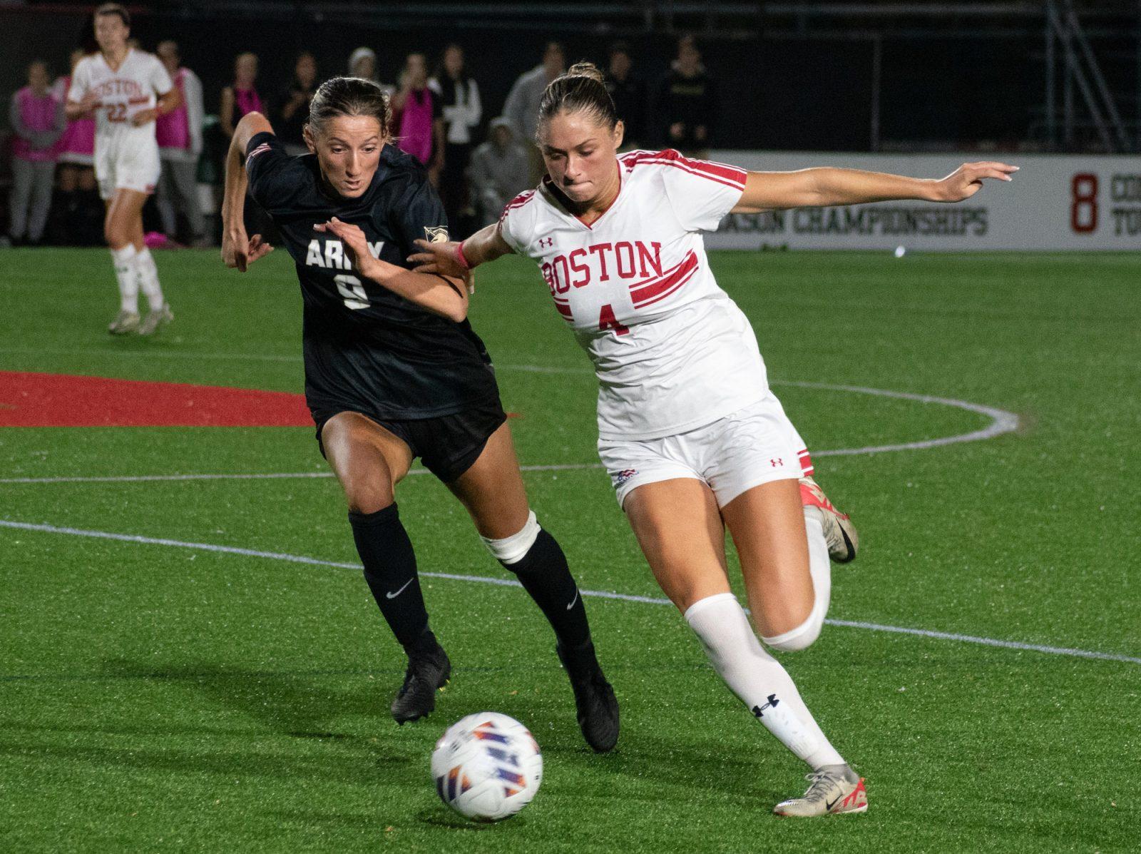 Junior midfielder Mackenzie Stickelman (4) runs for the ball in a game against Army West Point on Oct. 30. The Boston University women’s soccer season ended Friday after the team fell 4-1 to the University of Texas at Austin in the first round of the NCAA championship. JOHN DOWNES/DFP PHOTOGRAPHER