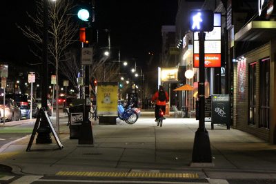 sidewalk along commonwealth avenue at night