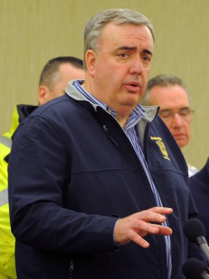 Former Boston Police Commissioner Edward Davis speaks at a press conference in 2013. Davis is calling for stronger domestic intelligence gathering. PHOTO BY MICHAEL CUMMO/WIKIMEDIA COMMONS 