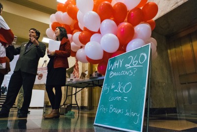 BU adjunct professors held a rally outside of the Tsai Performance Center. Their table was decorated with 260 balloons to symbolize the number of courses they would have to teach in a year to equate to President Brown’s $1.3 million salary. PHOTO BY BRIAN SONG/DAILY FREE PRESS STAFF