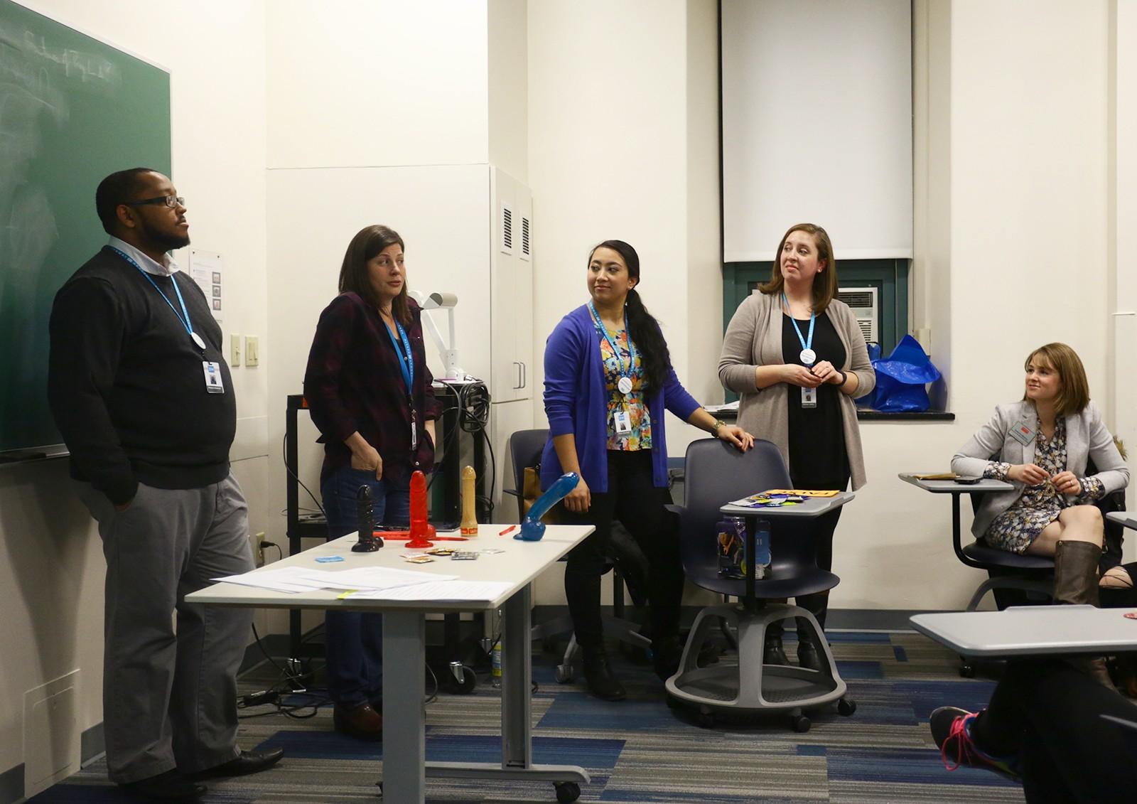 Representatives from The Fenway Institute at Fenway Health speak to students about how to have better, safer sex. PHOTO BY JOHNNY LIU/DAILY FREE PRESS STAFF 