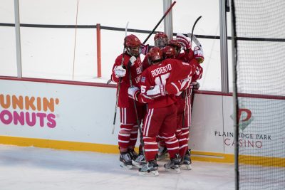 BOSTON, MA - JANUARY 07: Terriers celebrate a goal by forward Gabriel Chabot (10) during the third period of the game between the Boston University Terriers and the UMass Minutemen on January 8th, 2016, at Fenway Park in Boston, MA. (Photo by John Kavouris/Daily Free Press Staff)