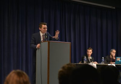 Nicholas Fuentes (CAS '20) makes his opening statement at the debate, which was organized following strong reactions to BU Today’s “Who I’ll Be Voting For” video series. PHOTO BY SHANE FU/ DAILY FREE PRESS STAFF 