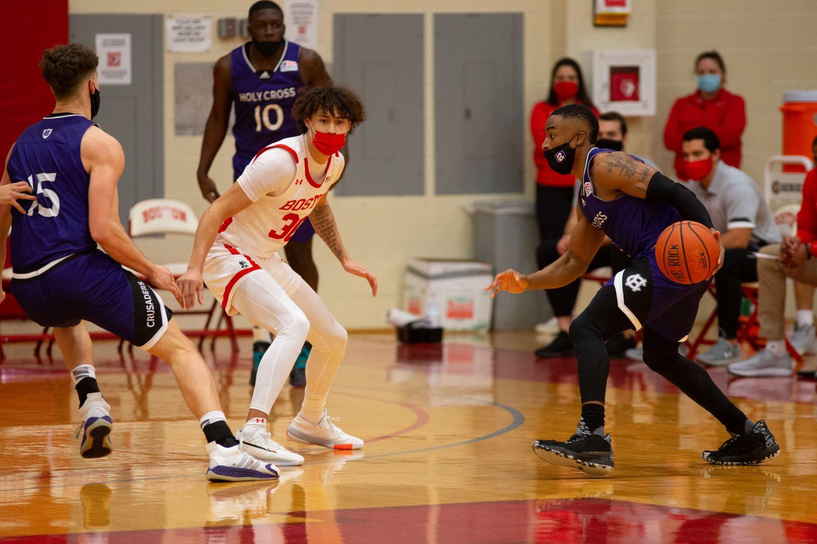 Senior guard Javante McCoy in a game against the College of the Holy Cross Tuesday. The Boston University men’s basketball team split its opening series against Holy Cross with a win on the road Monday and a loss at home Tuesday. COURTESY OF MATT WOOLVERTON VIA BU ATHLETICS