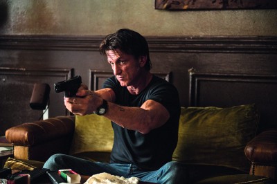 Sean Penn is Jim Terrier in “The Gunman”, which opened Friday. PHOTO COURTESY OF JOE ALBLAS/OPEN ROAD FILMS 